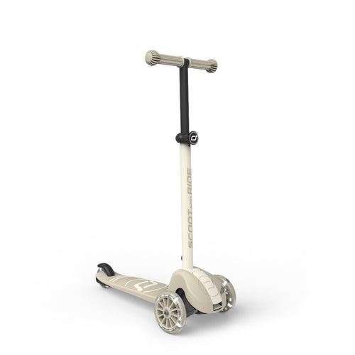 Beige scooter with a black handlebar on a white background