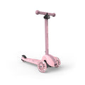 Pink scooter with a stand on a white background