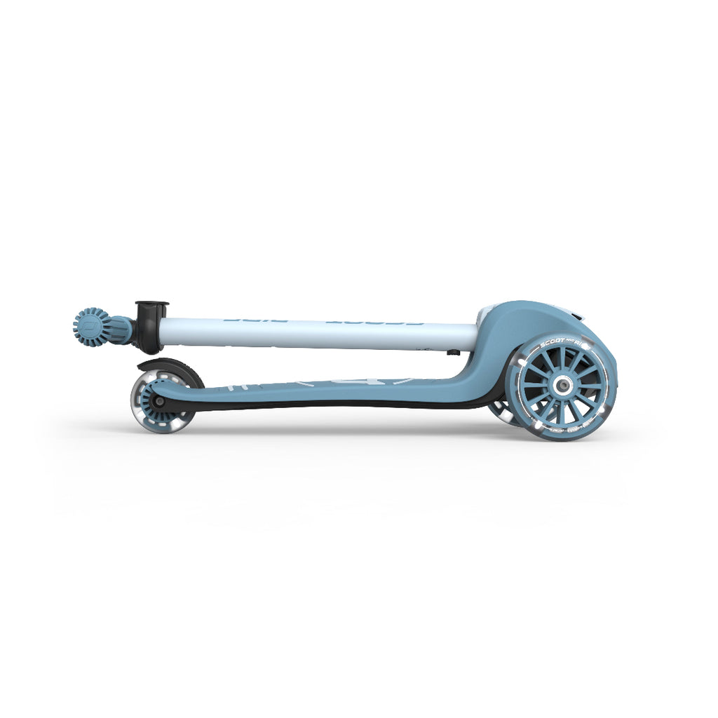 Light blue scooter with large wheels on a white background