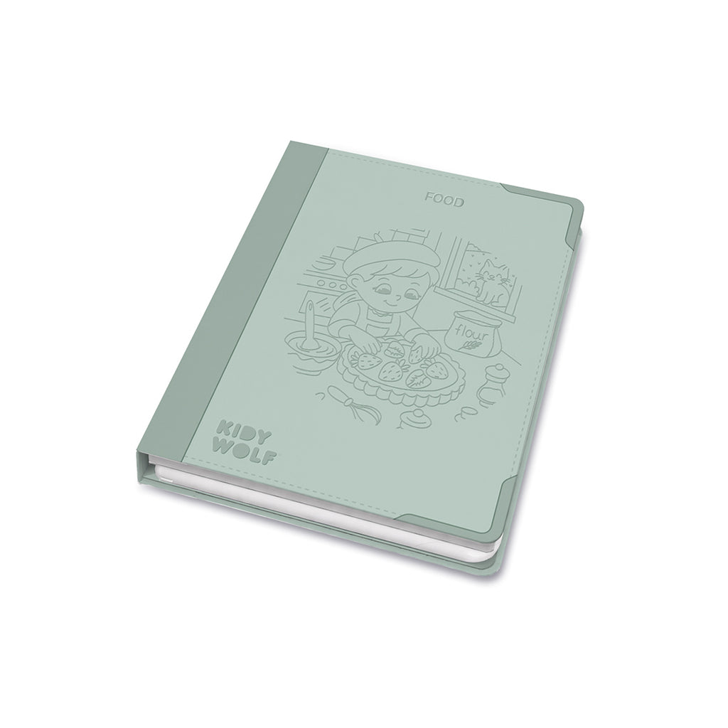 Light green notebook with embossed design and 'Koby Wolf' branding on a white background