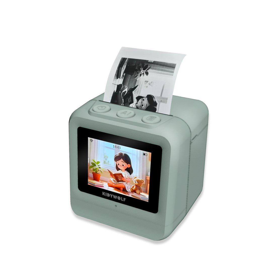 Green KIDYPRINTER AI with a longer black and white print rising from the top slot and a cartoon girl on the screen