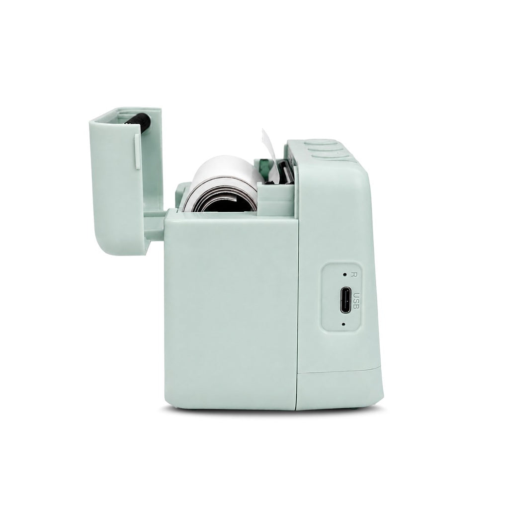 Side view of the green KIDYPRINTER AI with the lid open showing the paper roll and the USB-C charging port