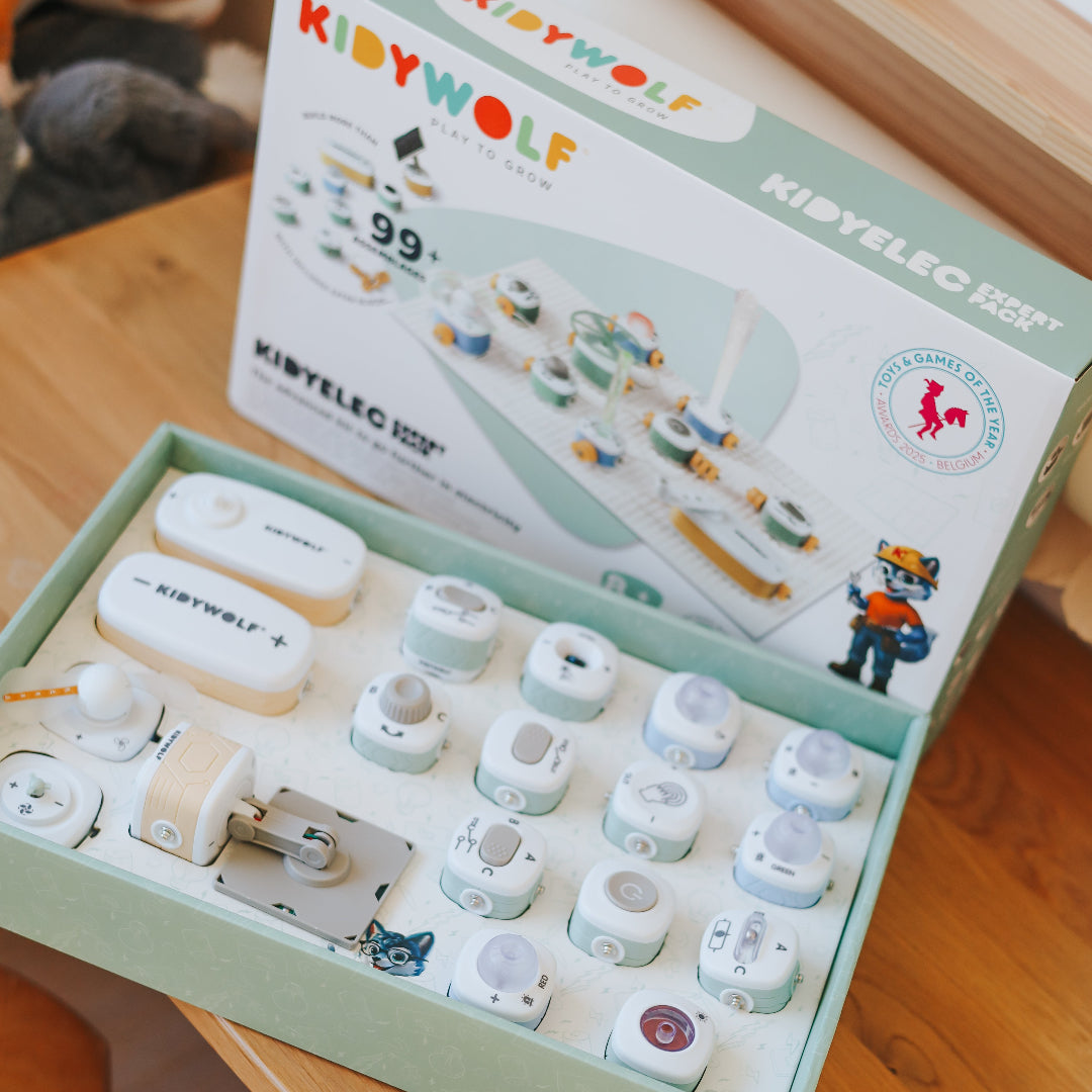 Toy set with packaging labeled 'Kiddy Wolf' on a wooden surface.