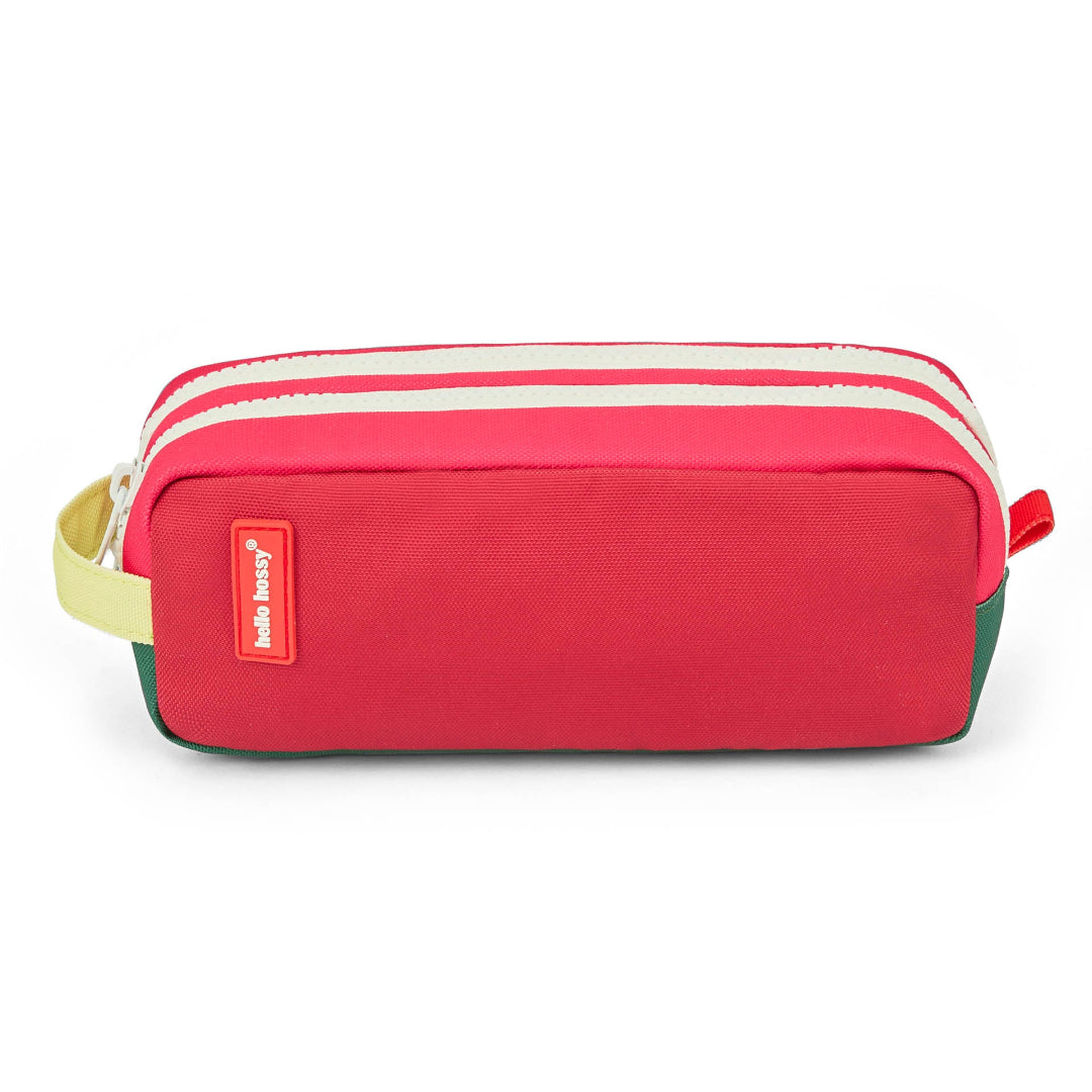 Red pencil case with a white zipper on a white background