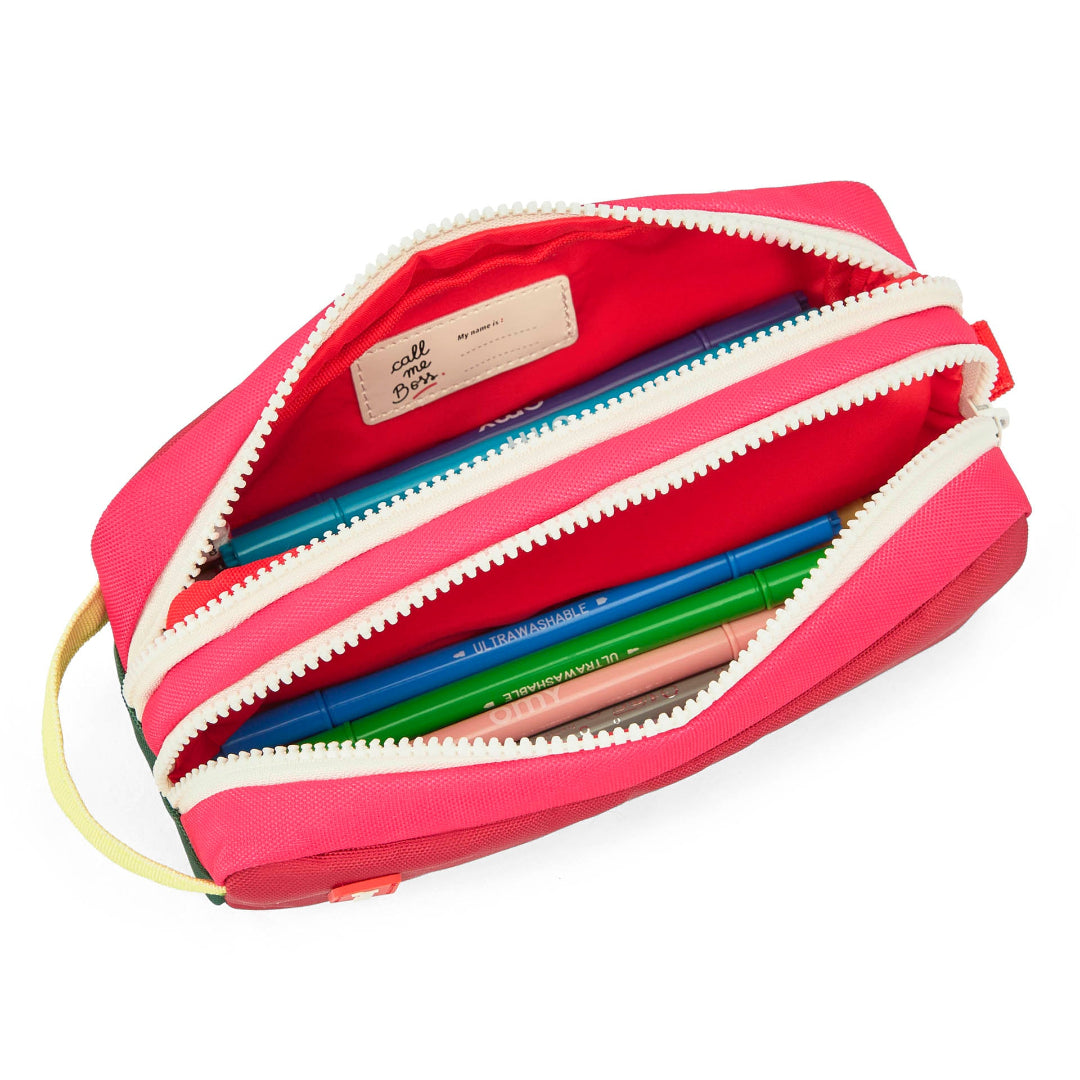 Pink & red pencil case with colourful pens on a white background
