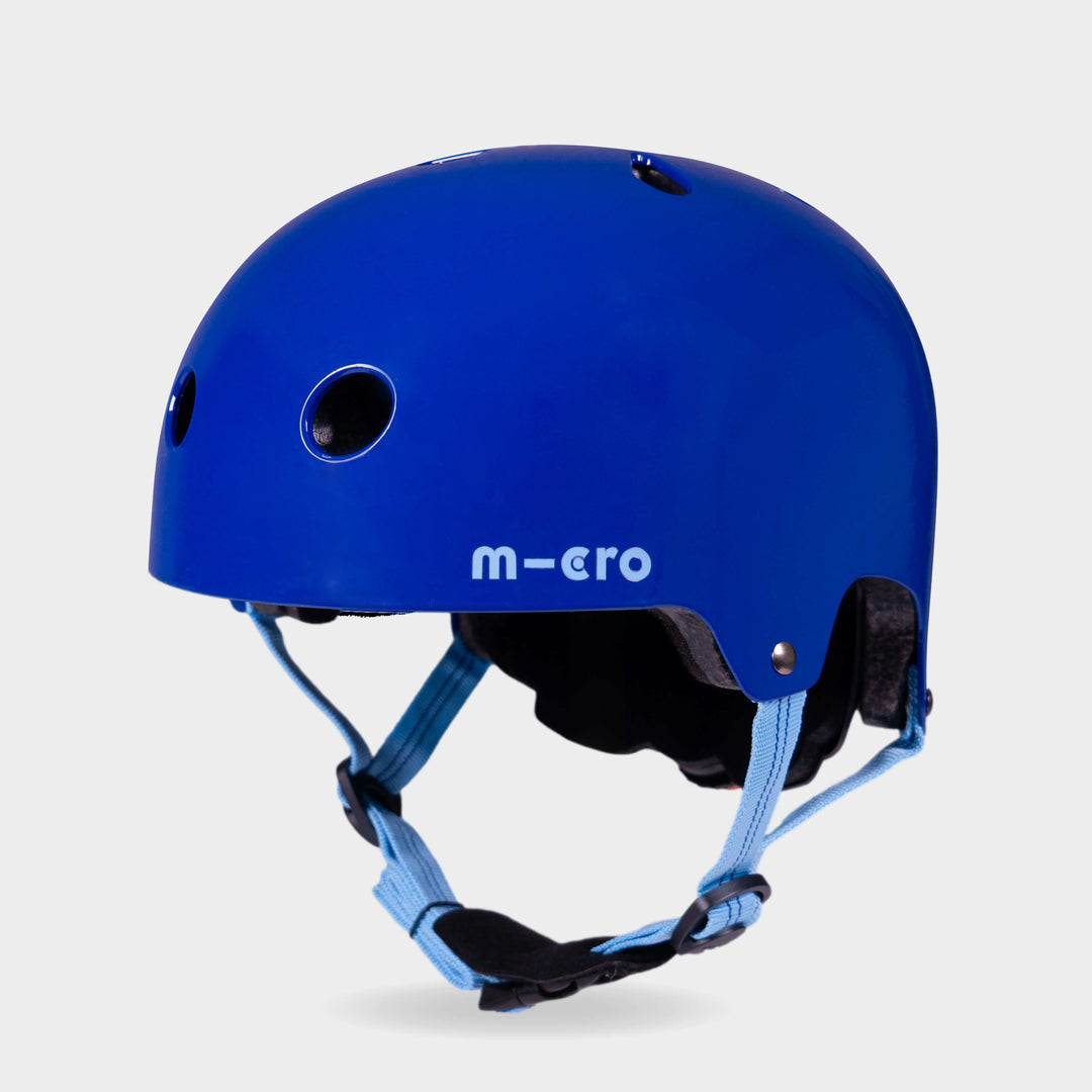 Micro plain helmet in matt blue with light blue straps, front three-quarter view