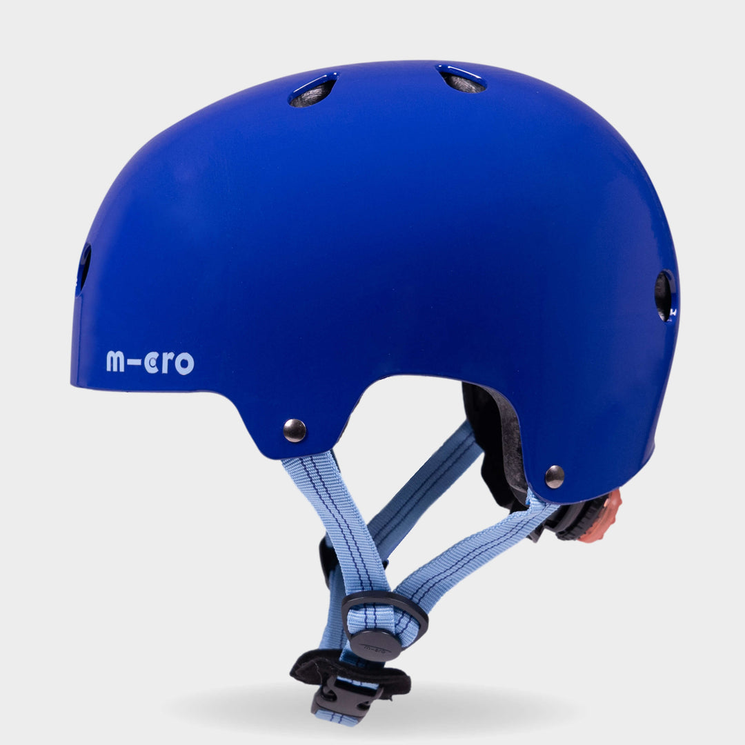 Side view of the blue Micro plain kids' helmet showing the air vents