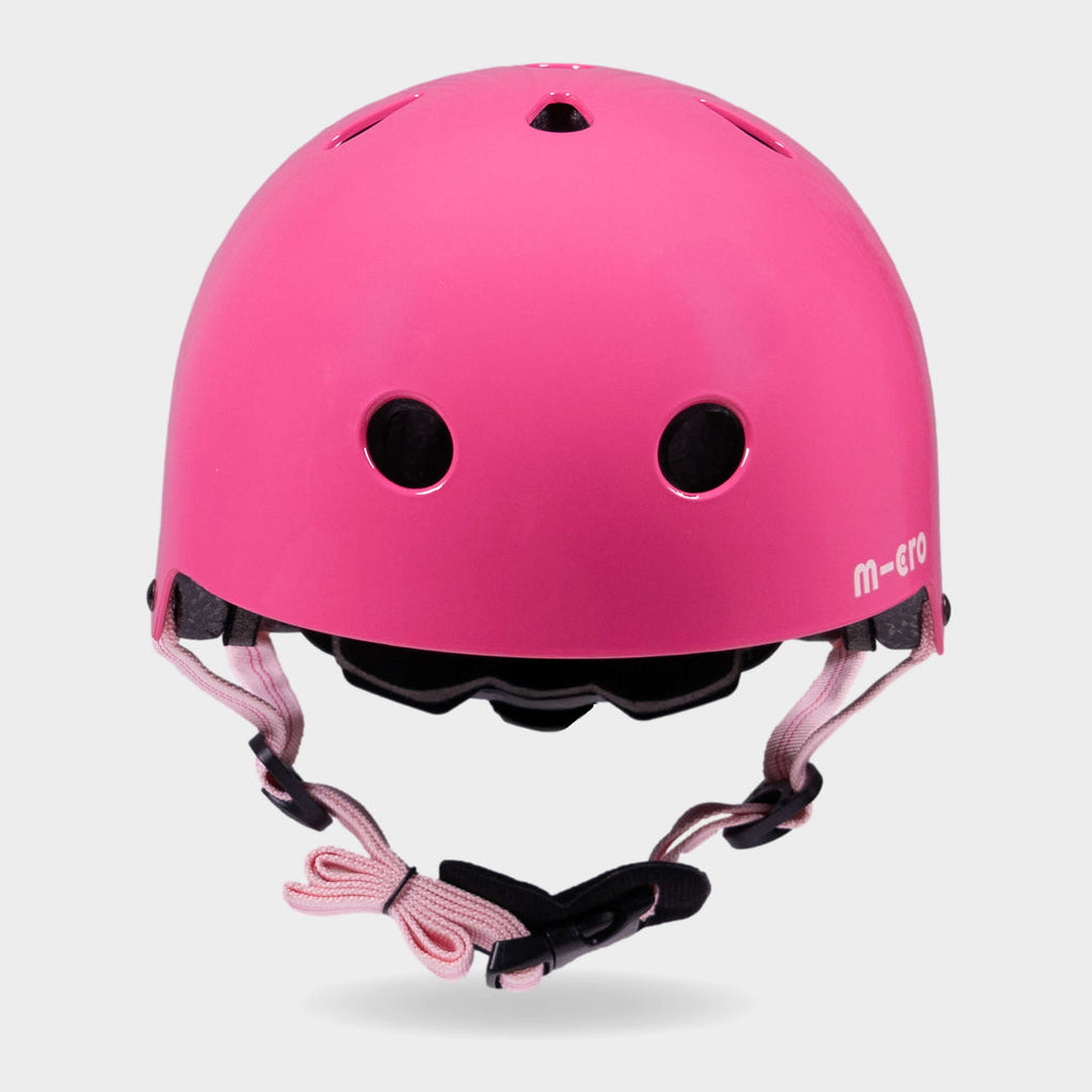 Front view of the pink Micro plain helmet with light pink straps