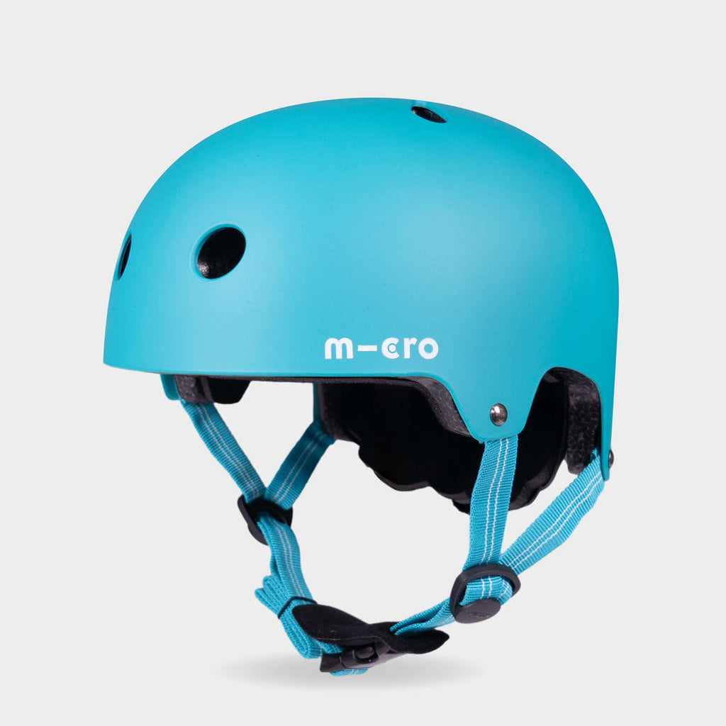 Micro plain helmet in matt aqua with aqua straps, front three-quarter view