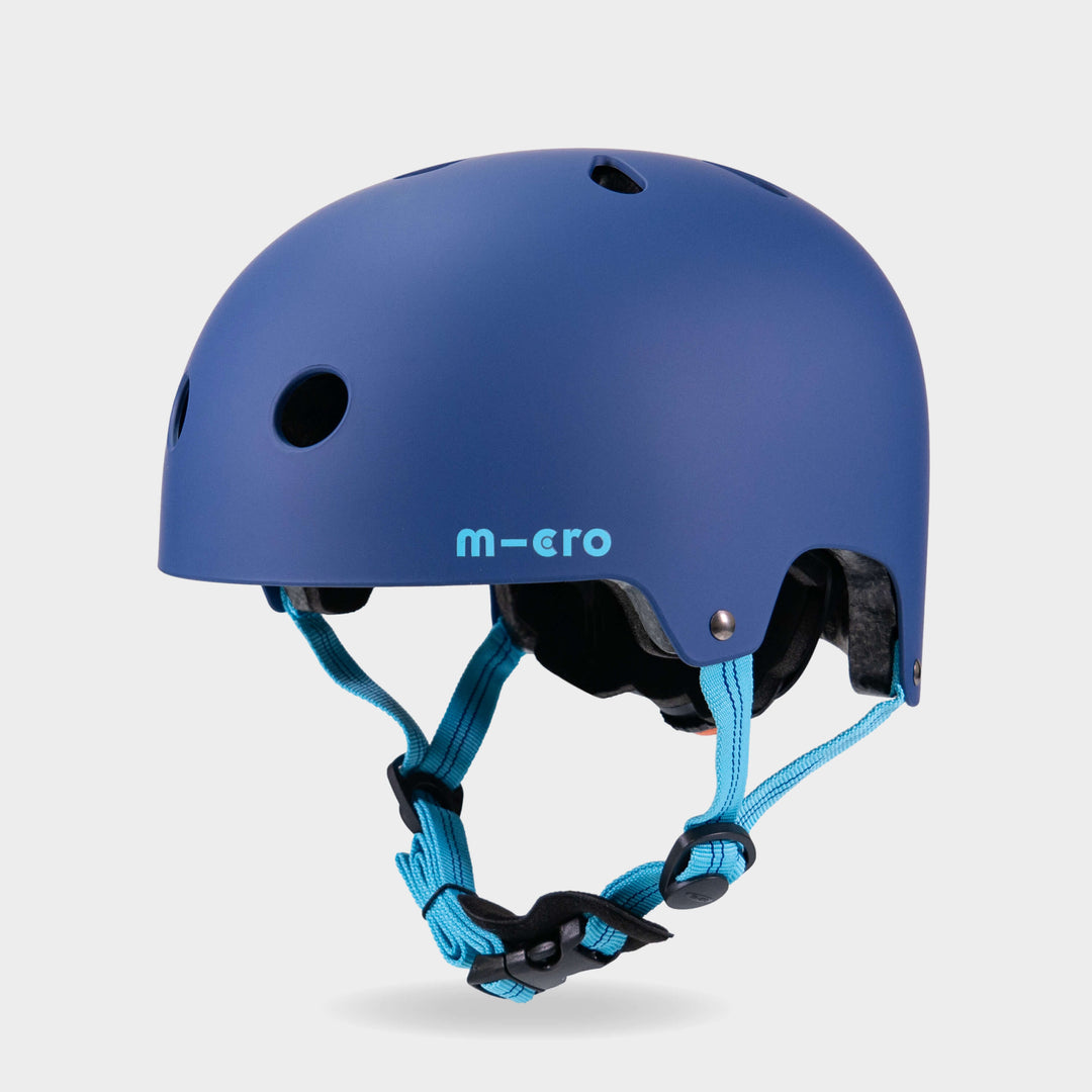 Micro plain helmet in matt navy with bright blue straps, front three-quarter view