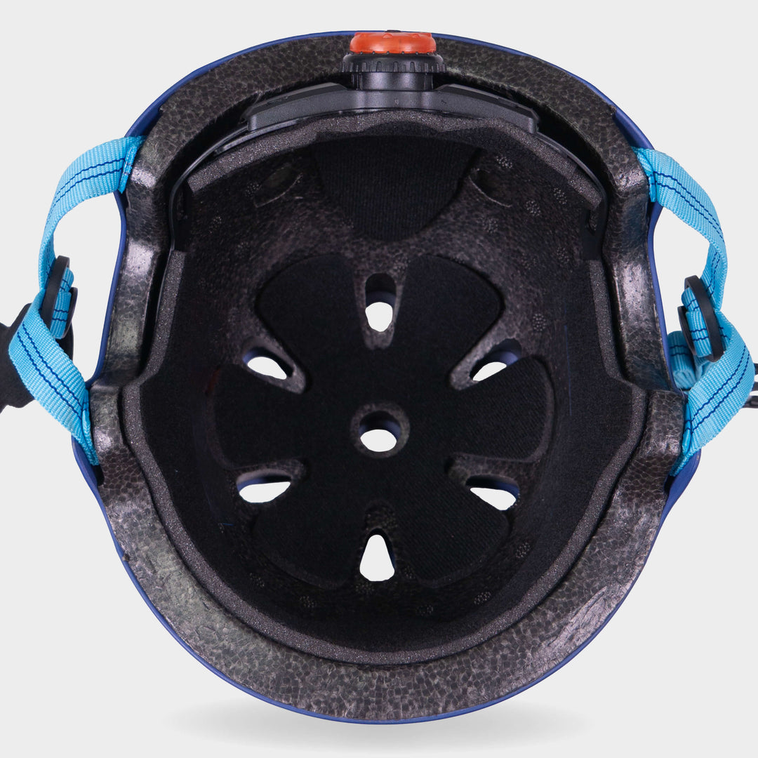 Inside view of the navy Micro helmet showing the black foam lining and vents