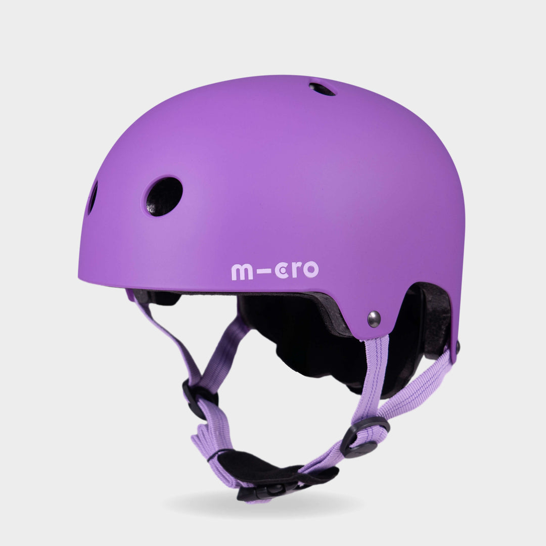 Micro plain helmet in matt purple with lilac straps, front three-quarter view