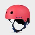 Micro plain helmet in matt red with navy straps, front three-quarter view