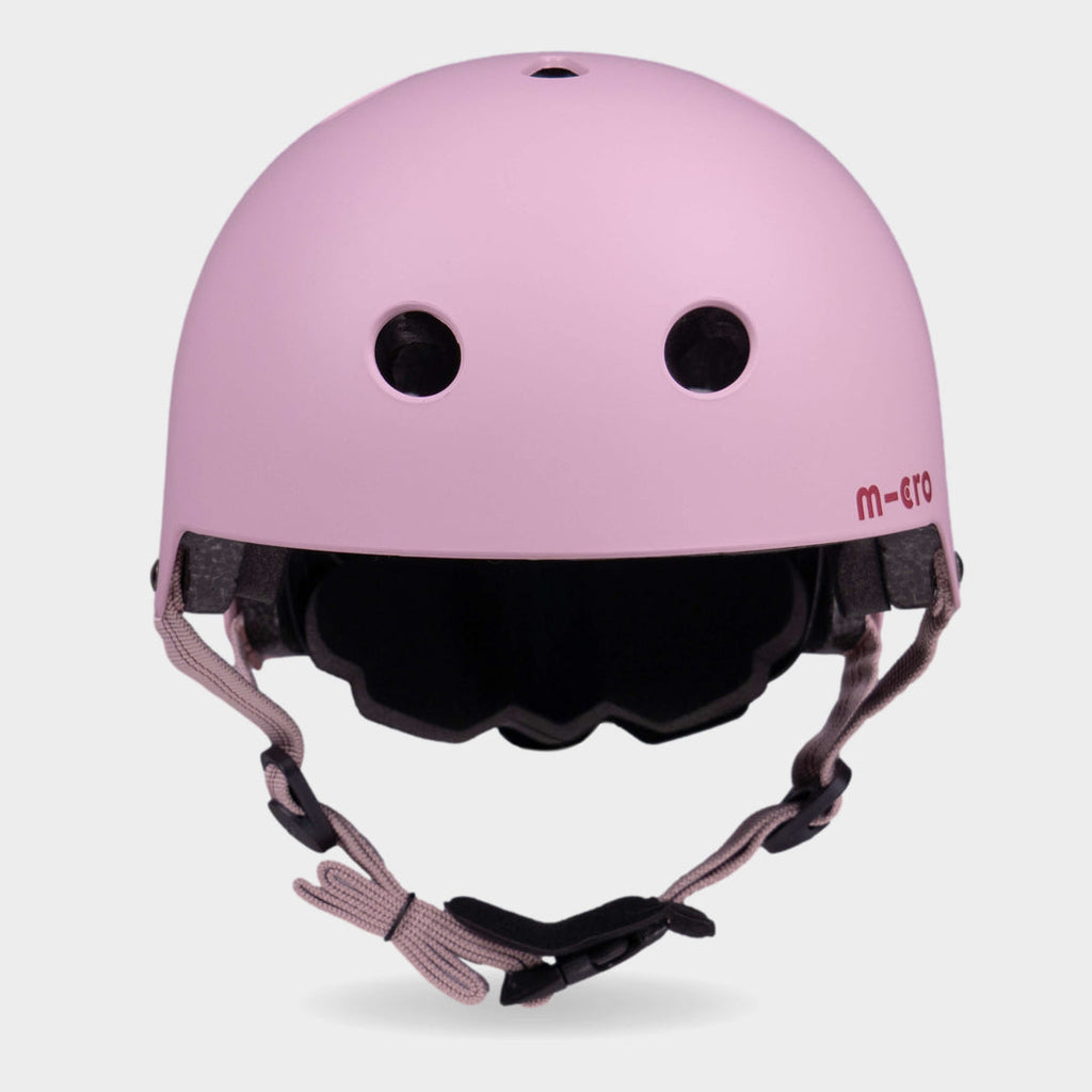 Front view of the rose pink Micro plain helmet with dusky pink straps