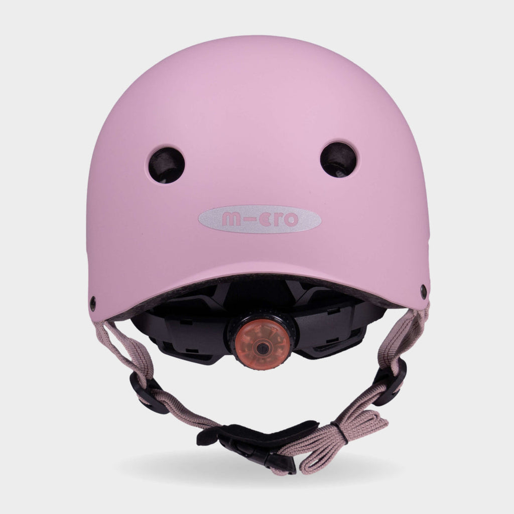 Back of the rose pink Micro plain helmet showing the rear light and micro logo