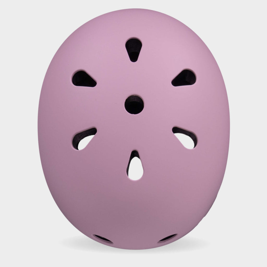 Top view of the rose pink Micro plain helmet showing the air vents
