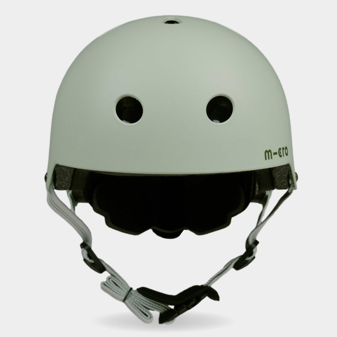 Front view of the sage green Micro plain helmet with grey-green straps