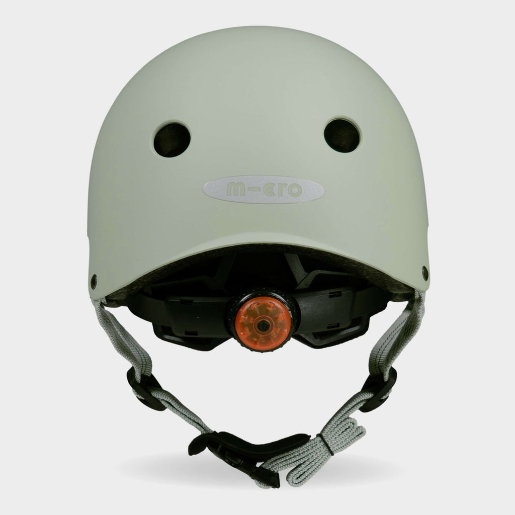 Back of the sage green Micro plain helmet showing the rear light and micro logo