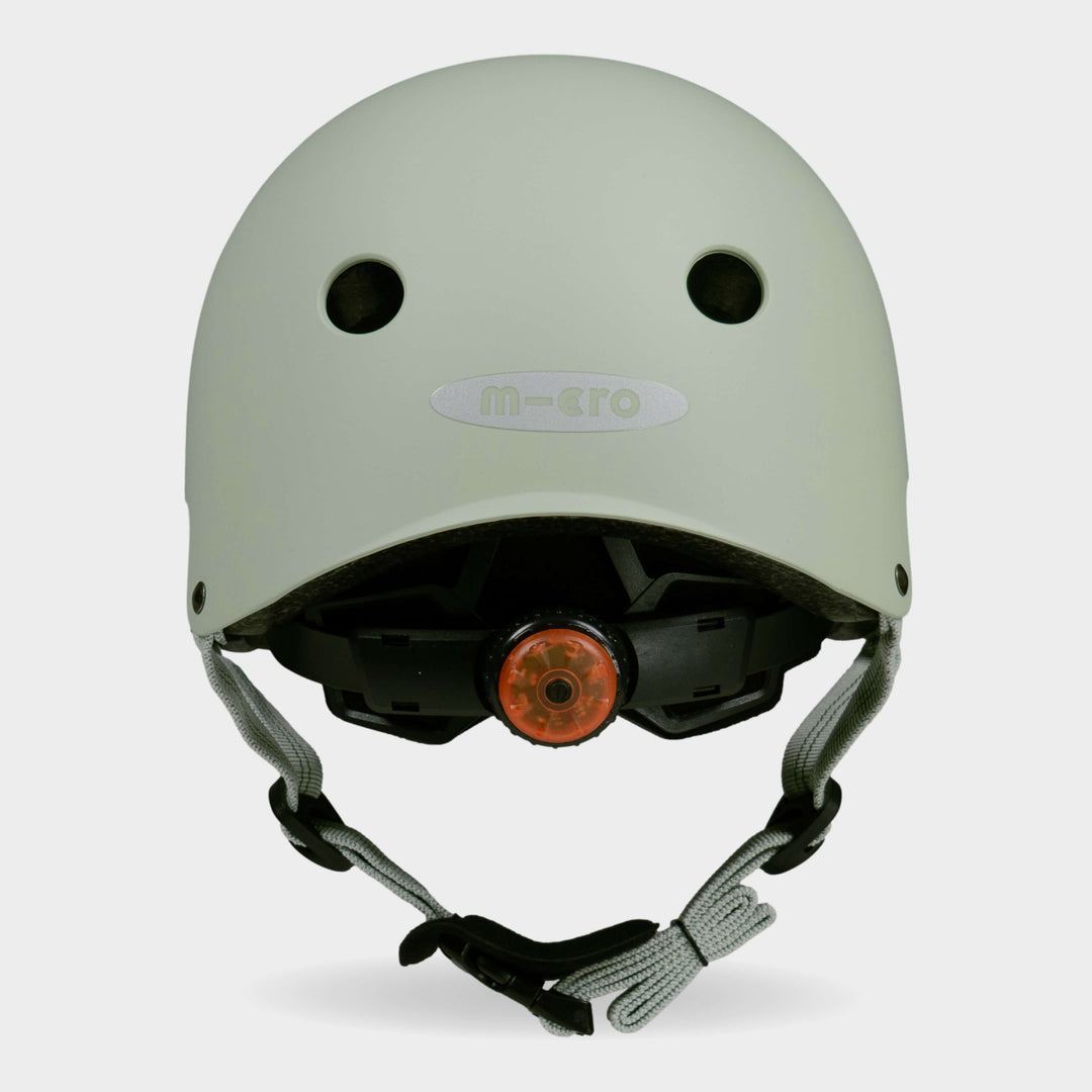 Back of the sage green Micro plain helmet showing the rear light and micro logo