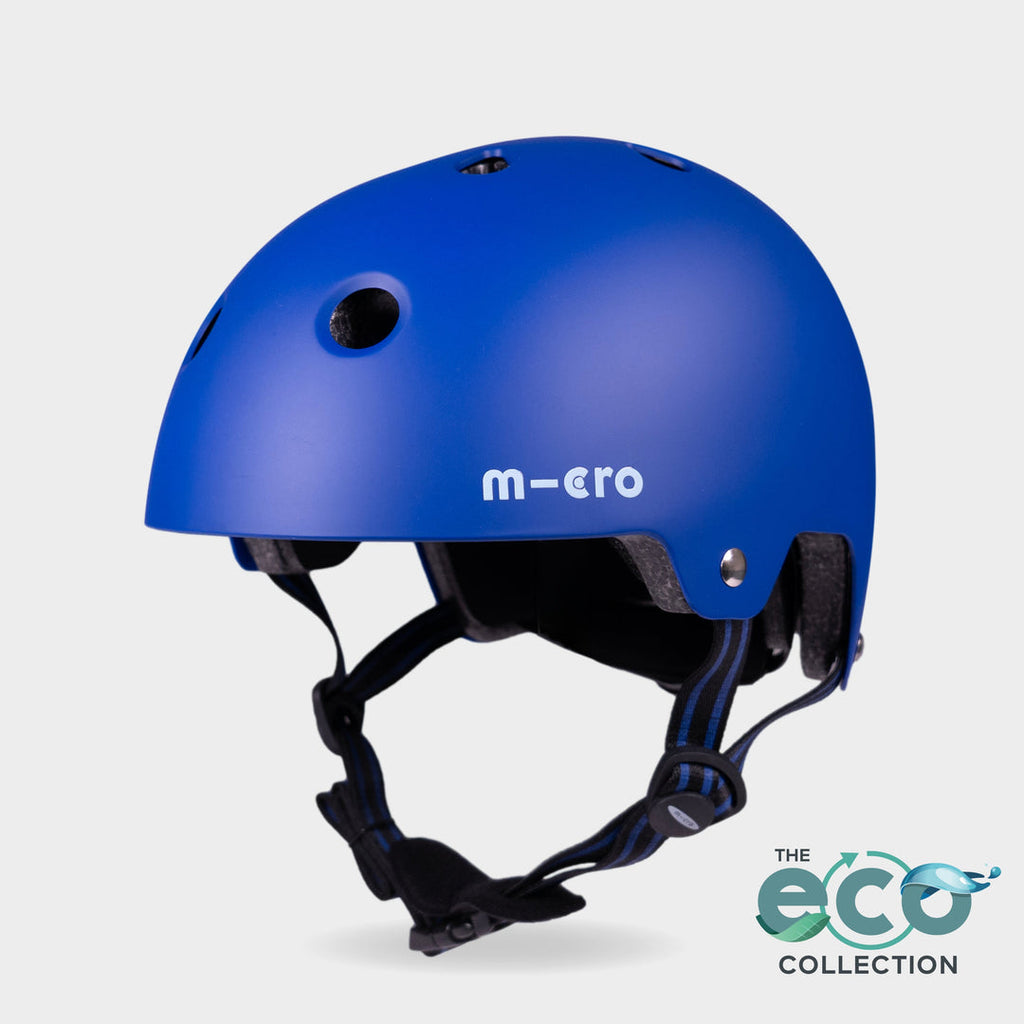 Micro Eco helmet in matt blue with black straps and the Eco Collection logo, front three-quarter view