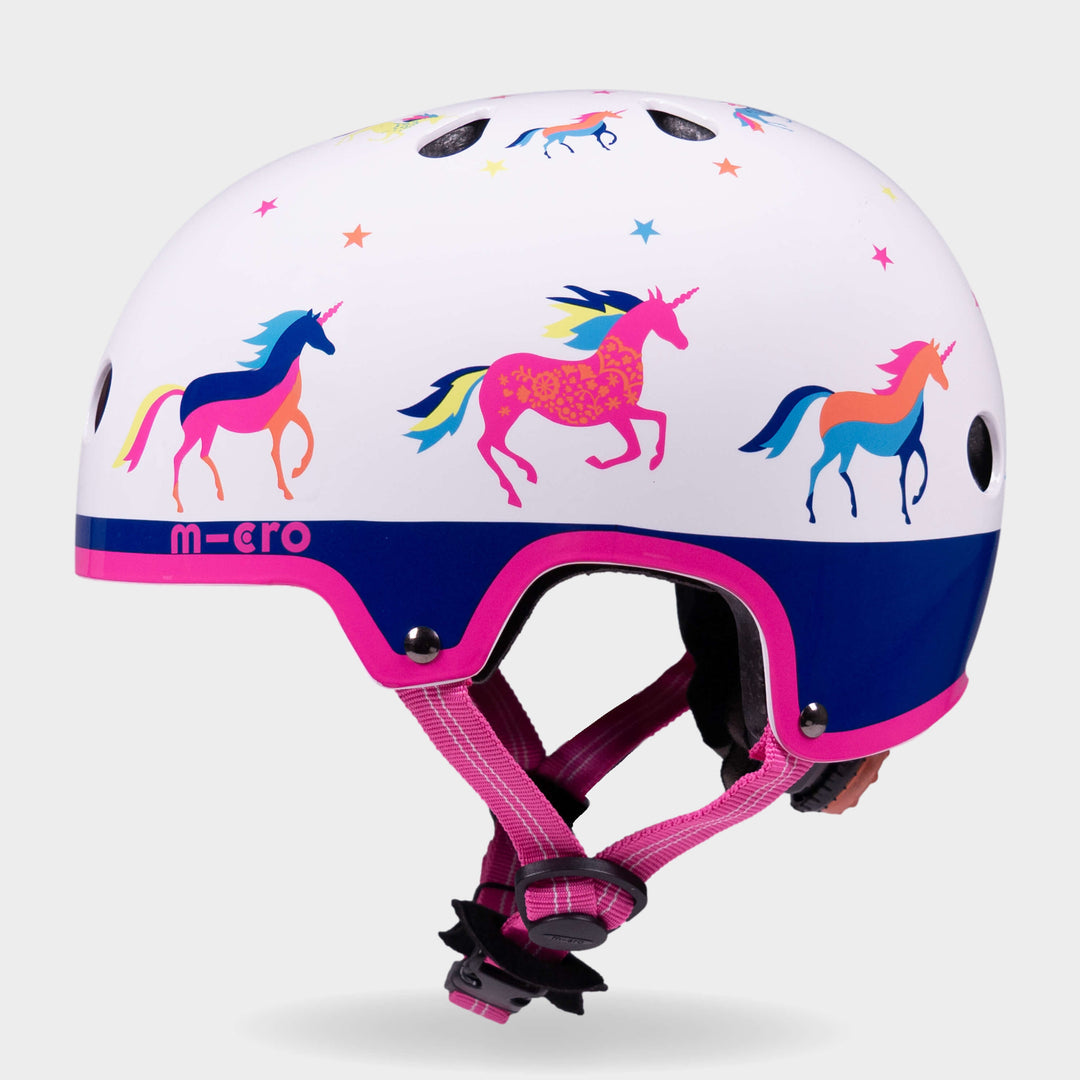 Side view of the Unicorn Micro kids' helmet with pink straps