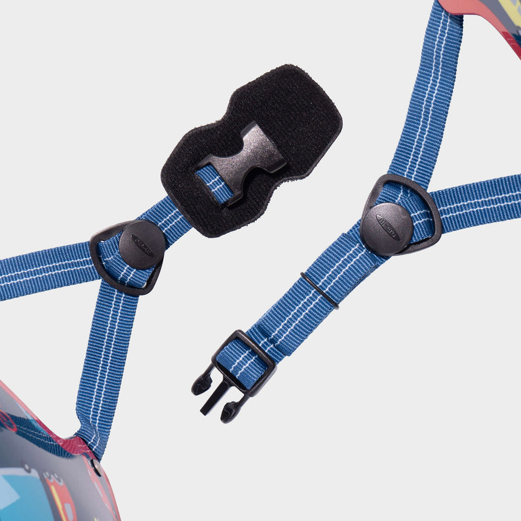 Close-up of the blue adjustable straps and black buckle on the Vehicle Micro helmet