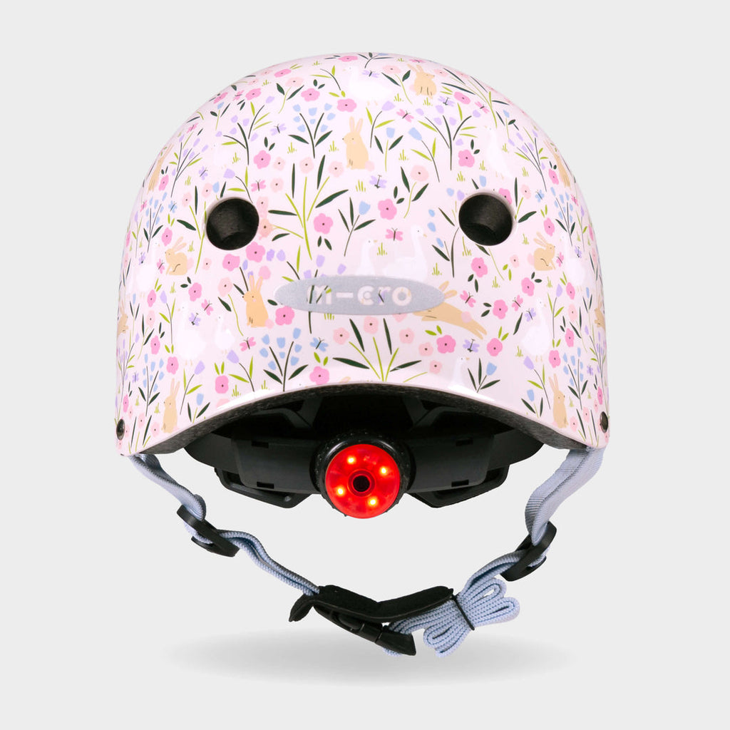 Back of the Flora & Fauna Micro helmet with the red rear safety light switched on