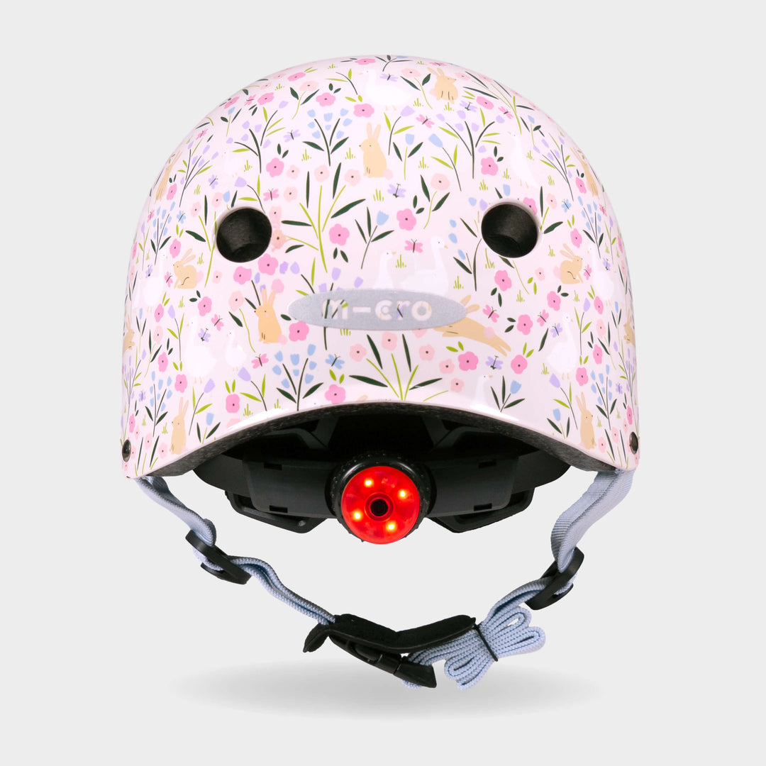 Back of the Flora & Fauna Micro helmet with the red rear safety light switched on
