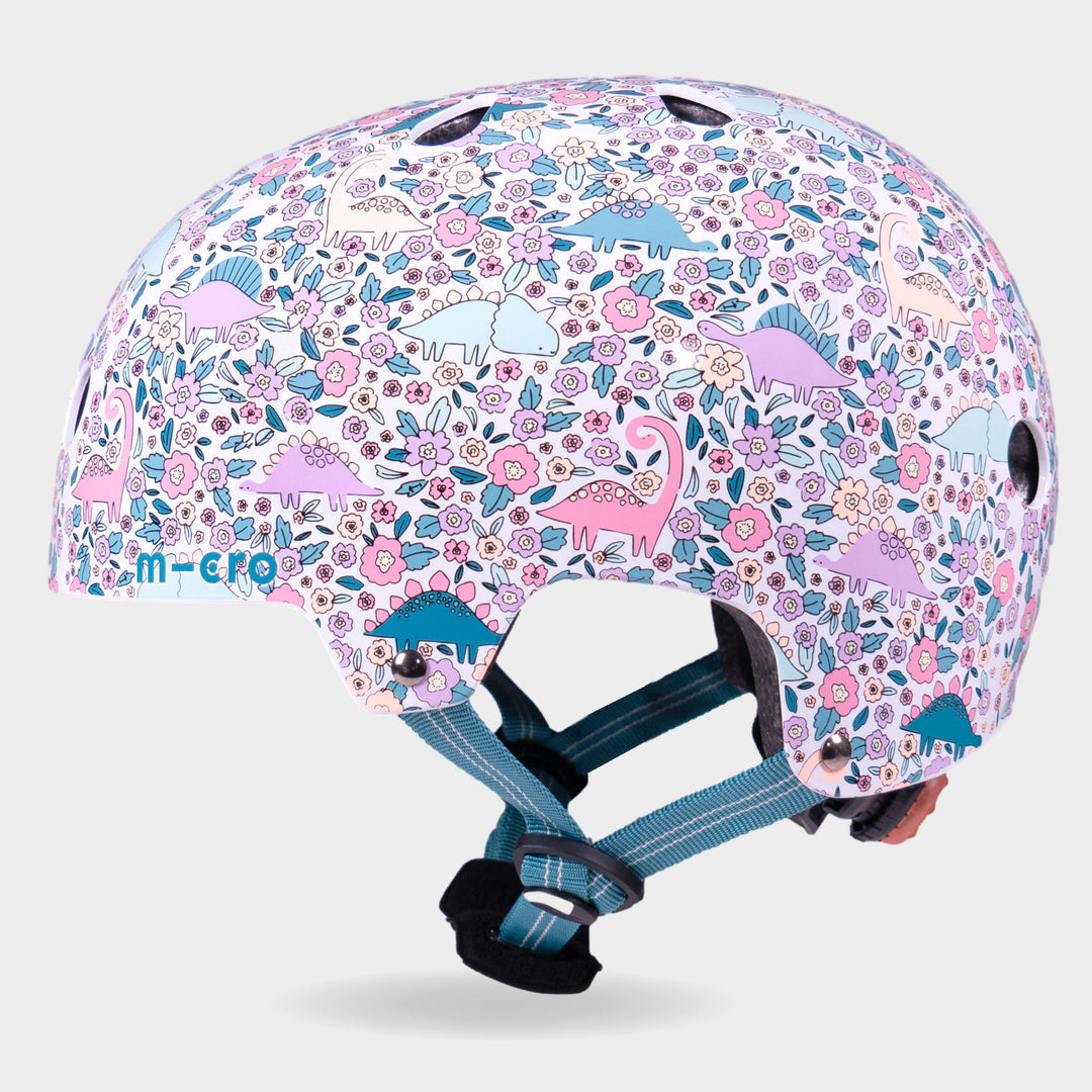 Side view of the Flora-Saur Micro kids' helmet showing the dinosaur and flower print