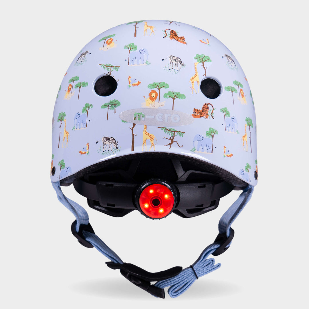 Back of the Blue Safari Micro helmet with the red rear safety light switched on