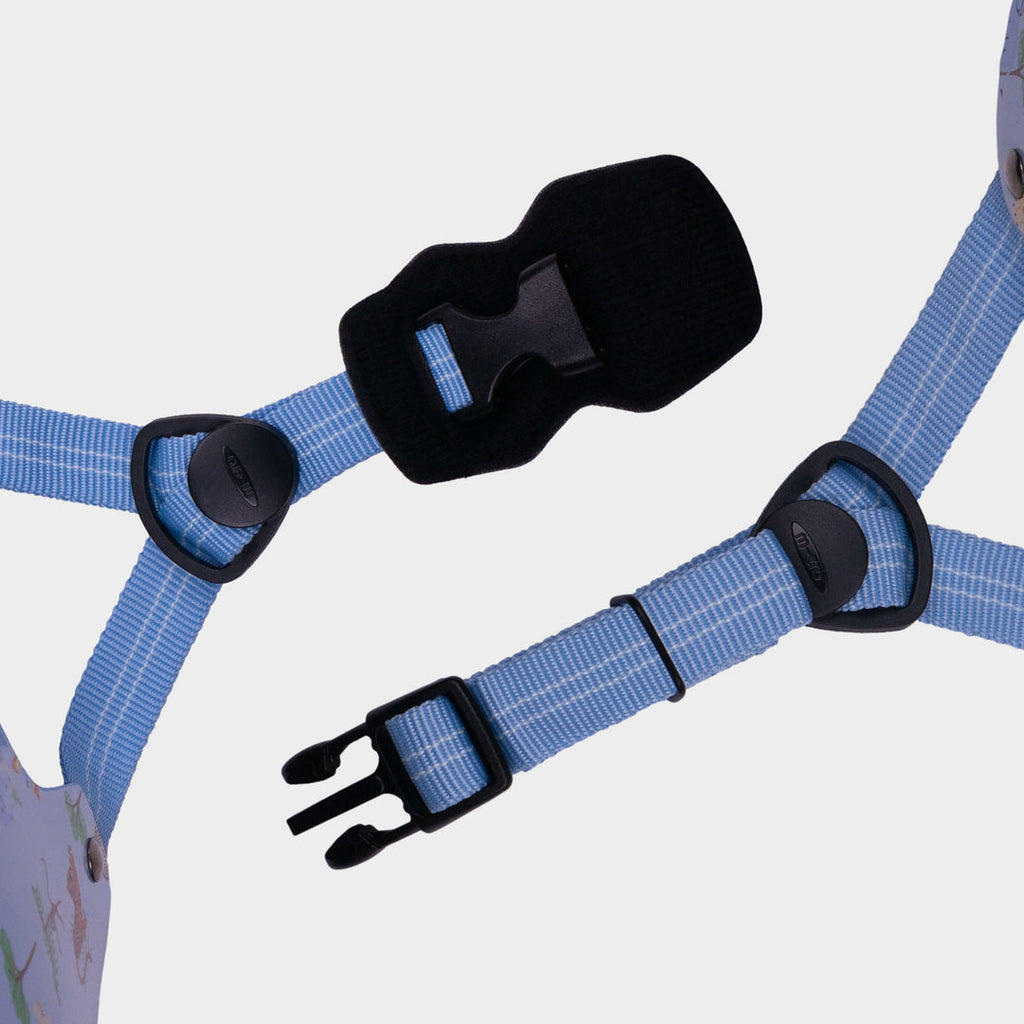 Close-up of the blue adjustable straps and black buckle on the Blue Safari Micro helmet