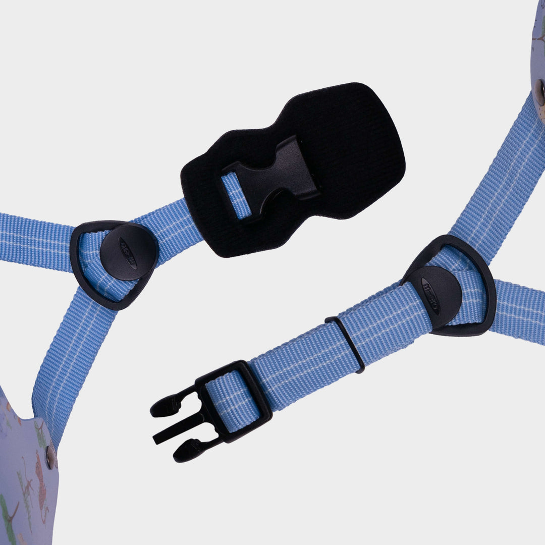 Close-up of the blue adjustable straps and black buckle on the Blue Safari Micro helmet
