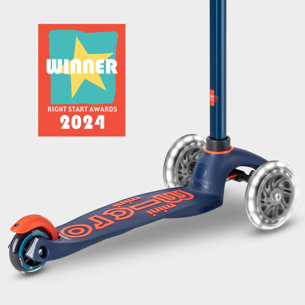 Navy Mini Micro Deluxe LED scooter with the Right Start Awards 2024 Winner badge