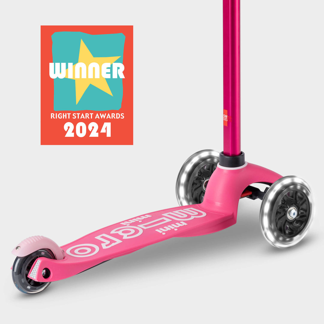 Pink Mini Micro Deluxe LED scooter with the Right Start Awards 2024 Winner badge