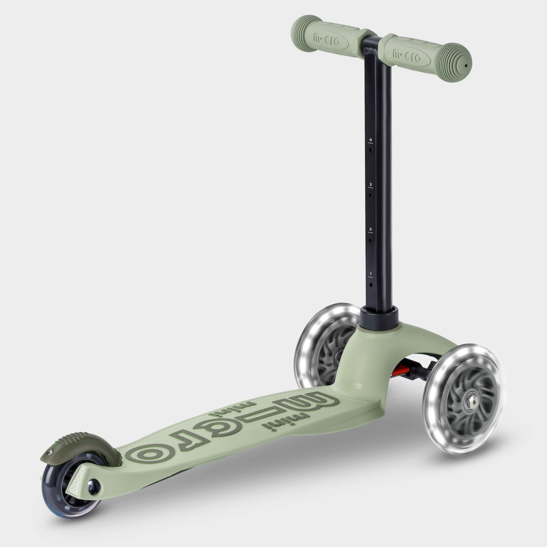 Sage green Micro Mini2Grow Deluxe LED set up as a three-wheel scooter, side view