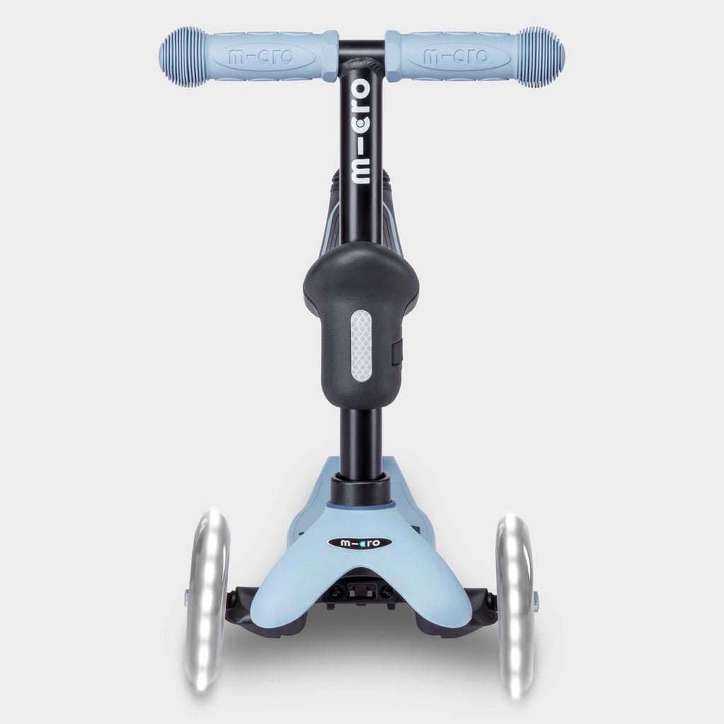 Front view of the soft blue Micro Mini2Grow Deluxe scooter with light-up front wheels