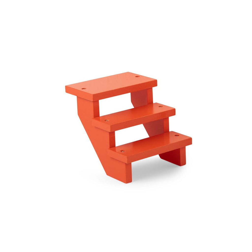 Orange wooden steps included with the Moulin Roty caravan