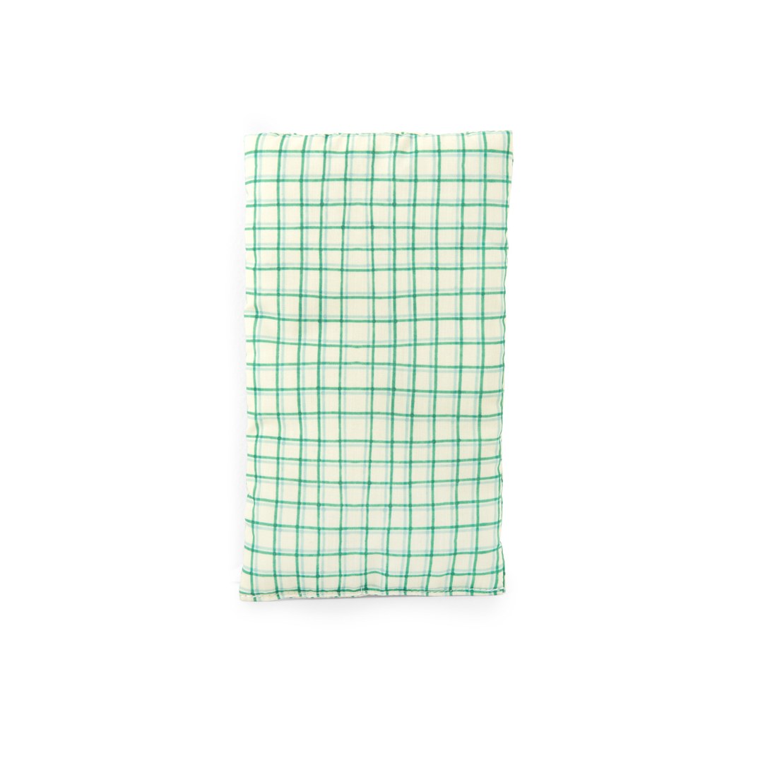 Green checked fabric mattress from the Moulin Roty caravan