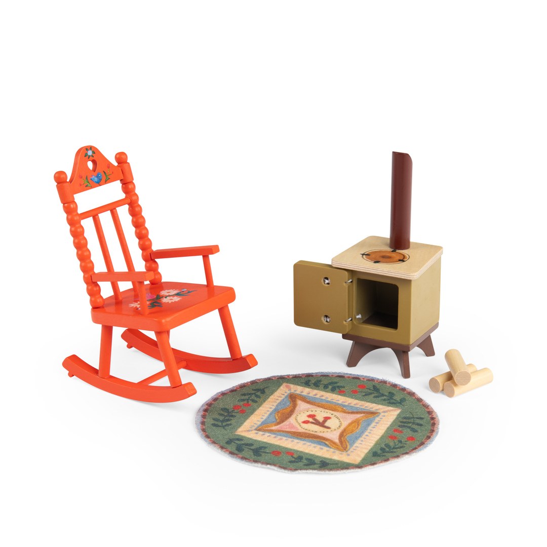 Moulin Roty cosy living room set with the stove door open