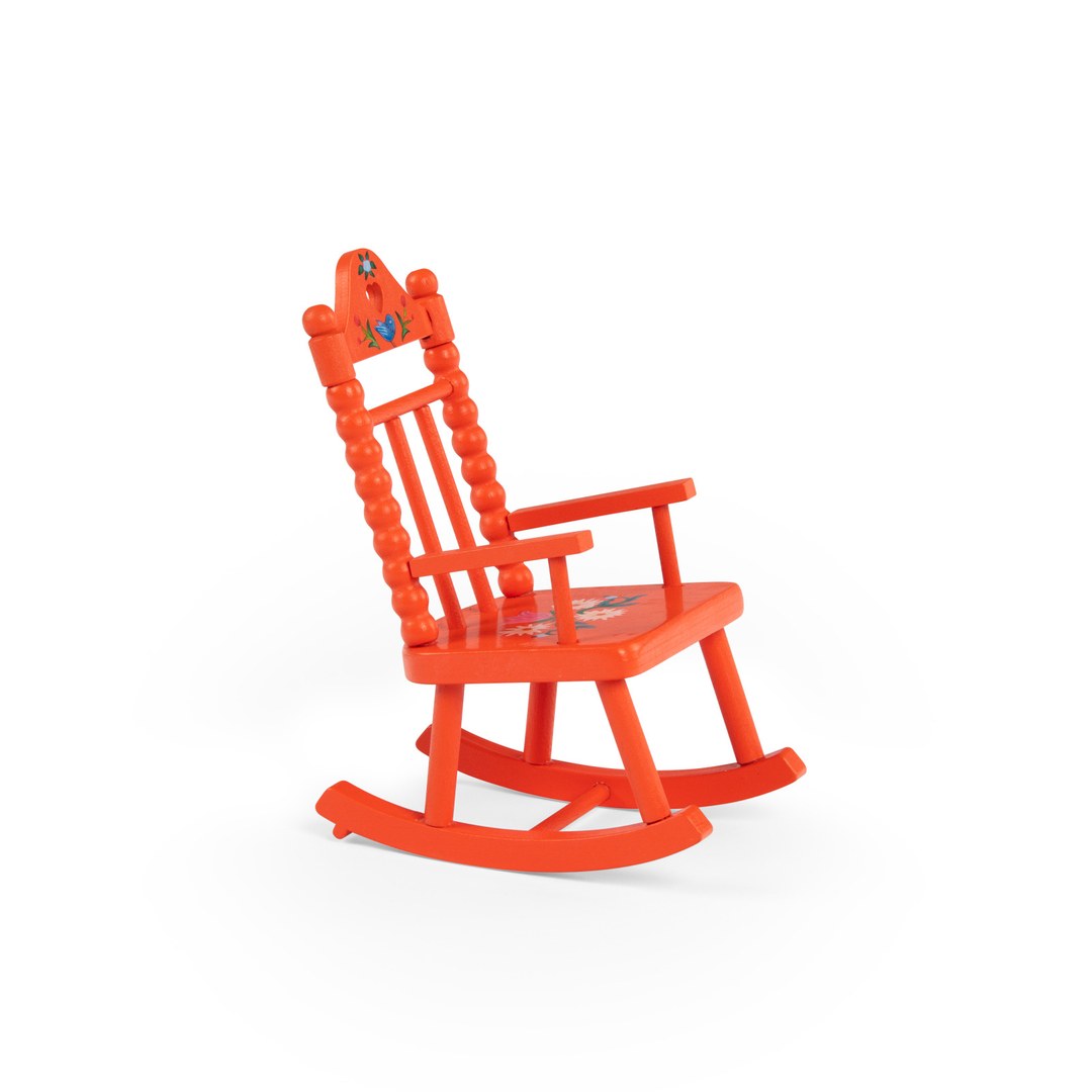 Orange wooden rocking chair from the Moulin Roty cosy living room set
