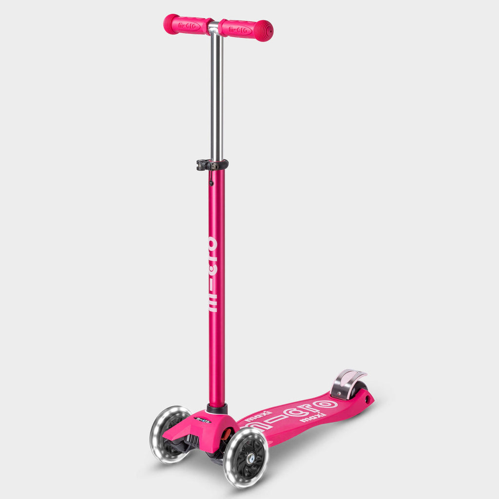 Maxi Micro Deluxe LED scooter in pink with light-up wheels, side view