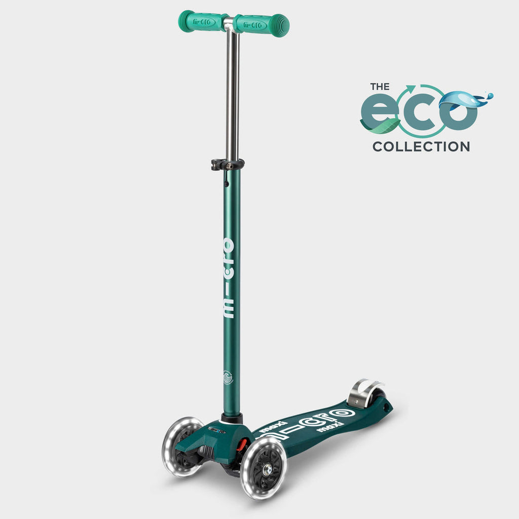 Maxi Micro LED scooter with recycled deck in dark green, side view with the Eco Collection logo