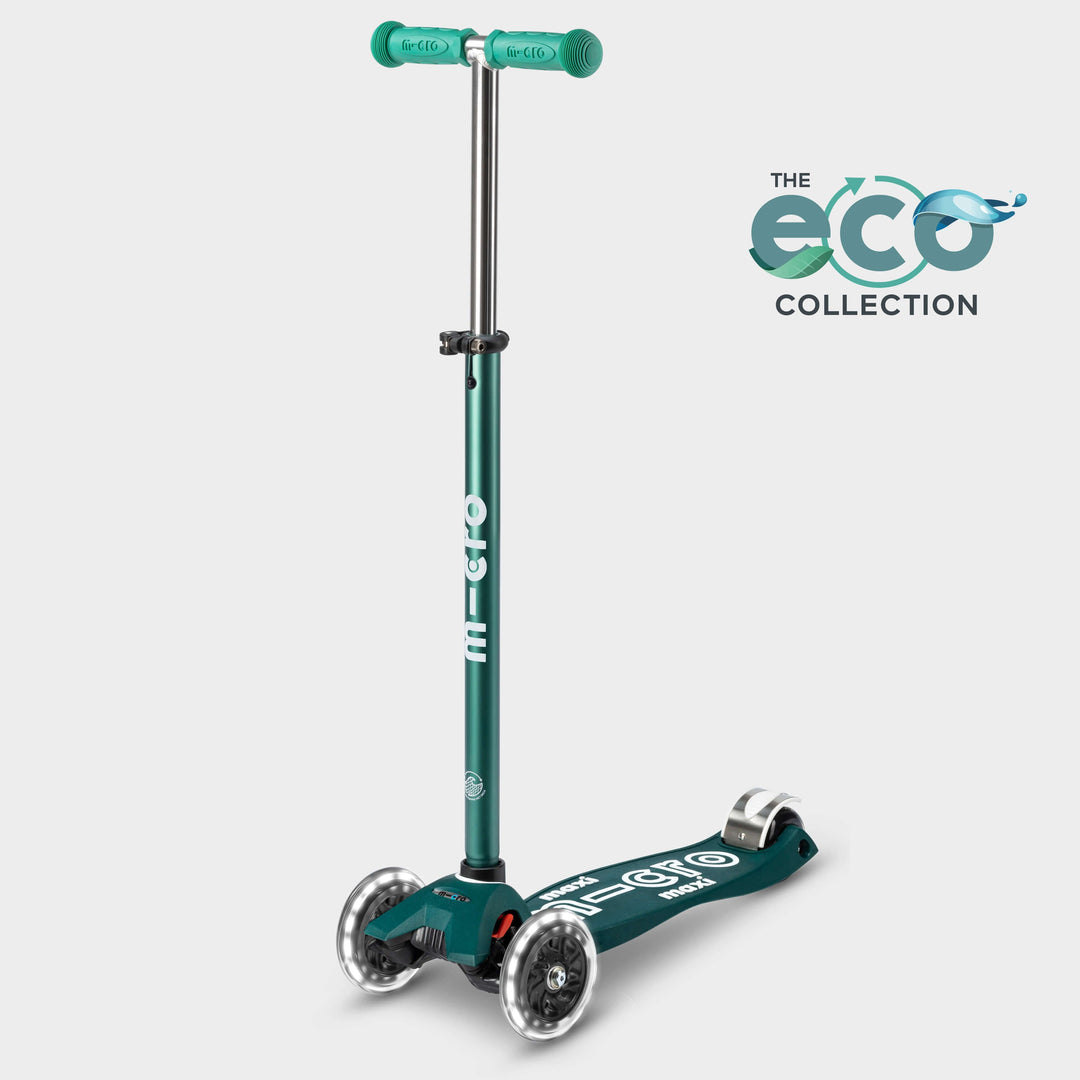 Maxi Micro LED scooter with recycled deck in dark green, side view with the Eco Collection logo