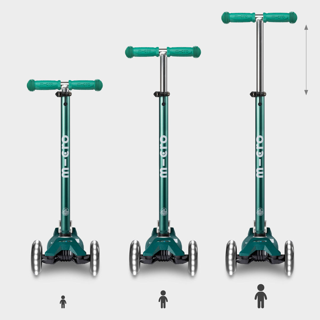 Three green Maxi Micro LED Eco scooters showing the handlebar height adjusting as a child grows