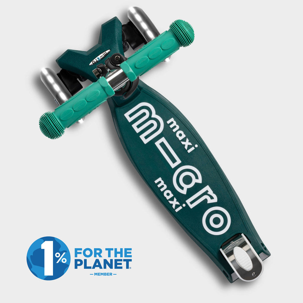 Top-down view of the green Maxi Micro Eco deck with the 1% for the Planet logo