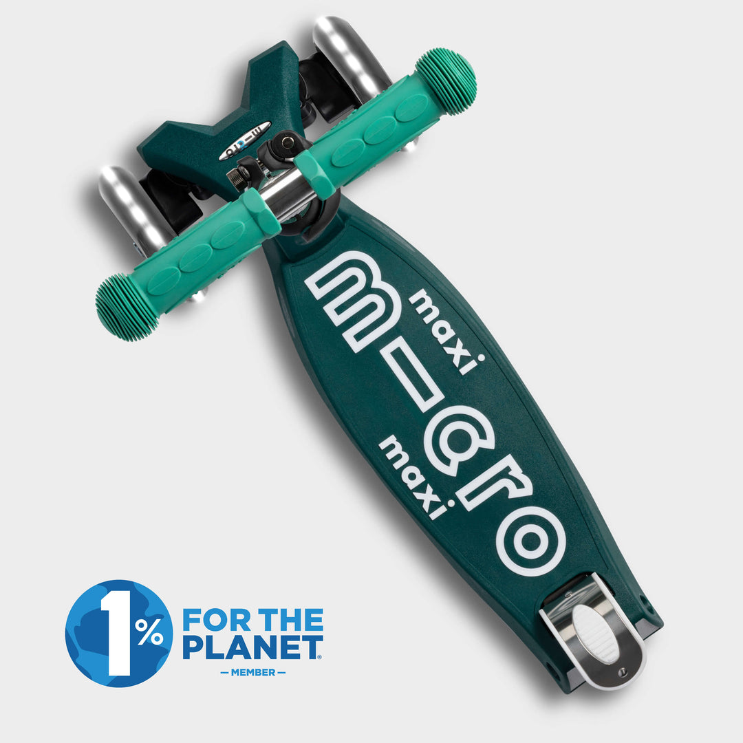 Top-down view of the green Maxi Micro Eco deck with the 1% for the Planet logo