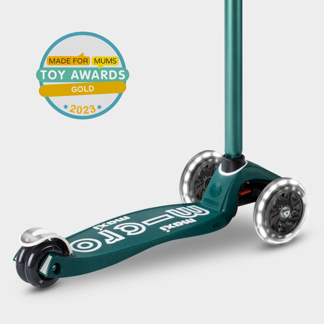 Green Maxi Micro LED Eco scooter with the Made for Mums Toy Awards 2023 Gold badge