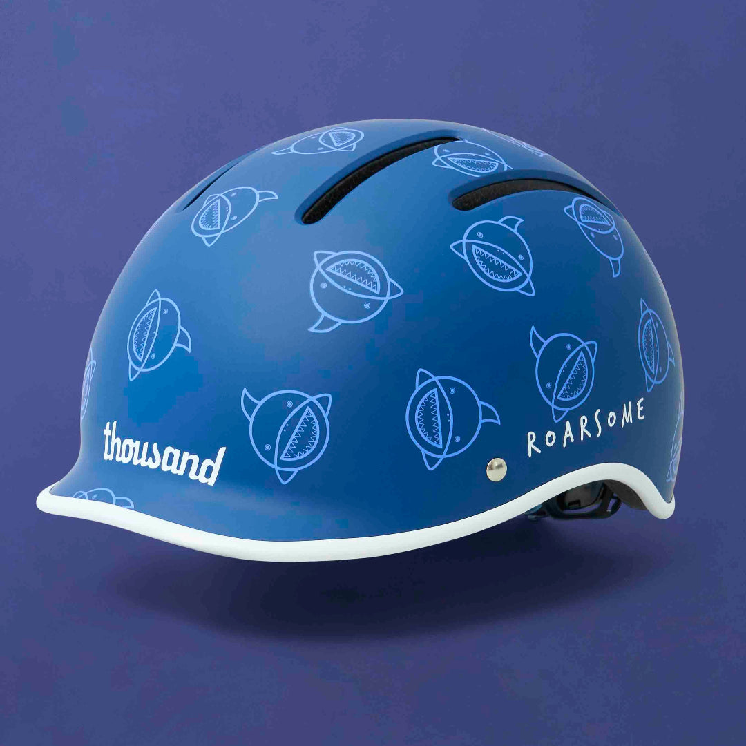Blue helmet with white patterns and text on a blue background