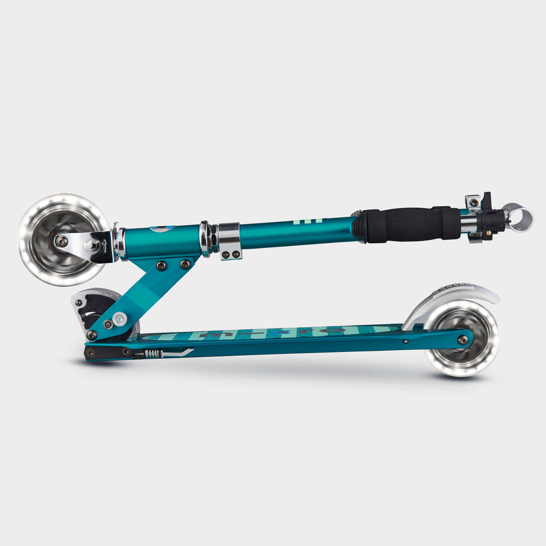 Aqua Micro Sprite LED scooter folded flat, side view