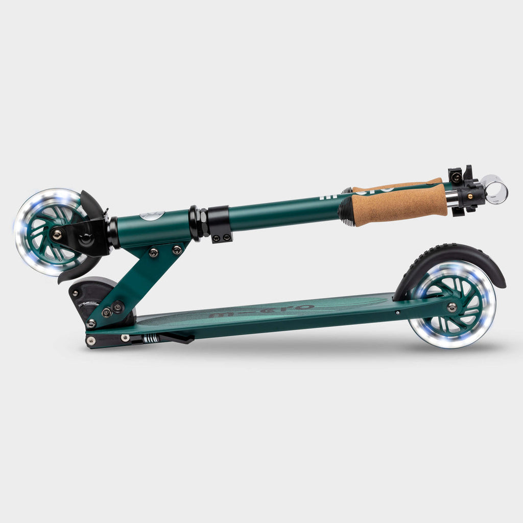 Green Micro Recycled Sprite LED scooter folded flat, side view